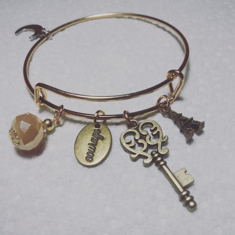 Courage and key charm bracelet